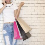 Girl Shopping Bags Standing Talking  - StockSnap / Pixabay