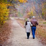 Couple Elderly Walking Fall Trail  - EddieKphoto / Pixabay