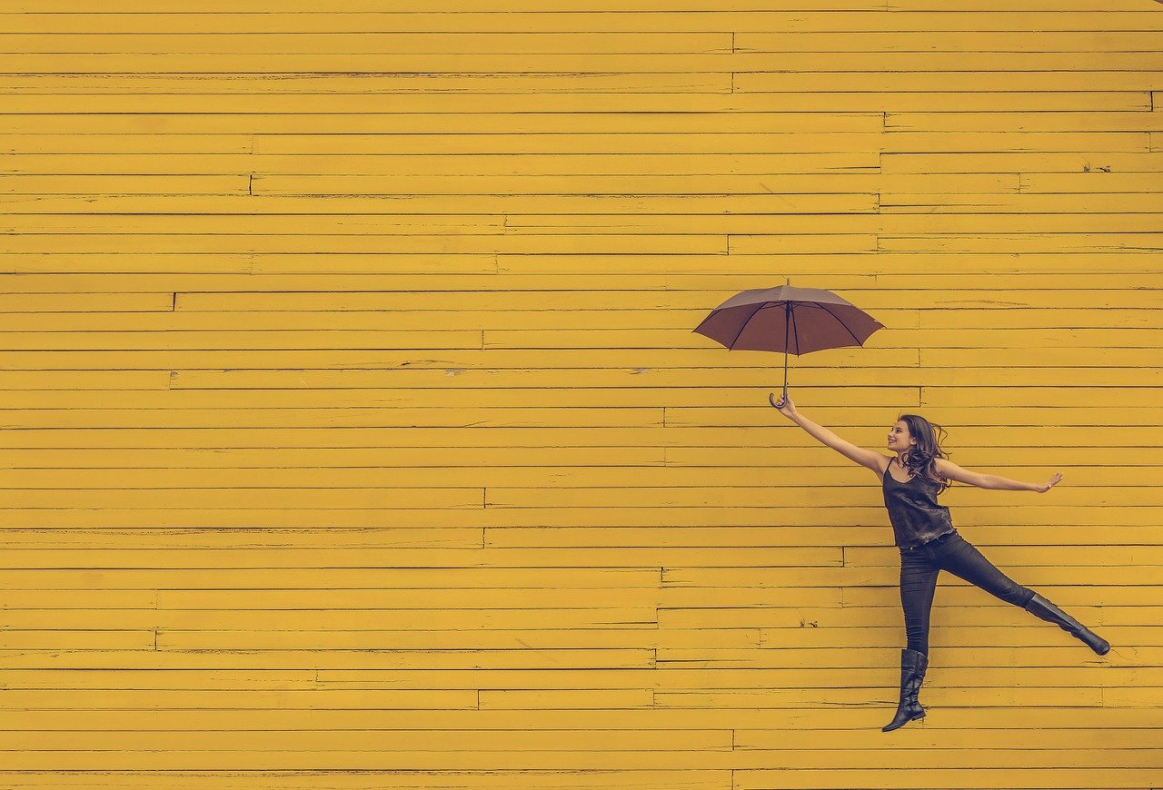 Woman Umbrella Floating Jumping  - Pexels / Pixabay